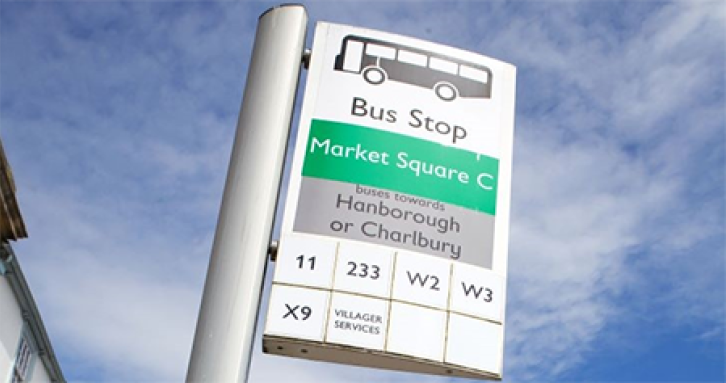 Bus stop in Oxfordshire against a blue sky.